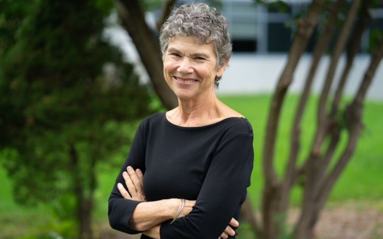 A woman with short grey hair